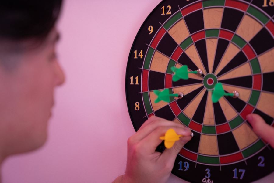 person playing darts