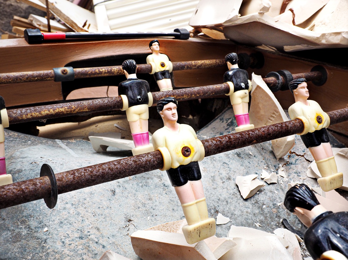 Broken parts of a foosball table