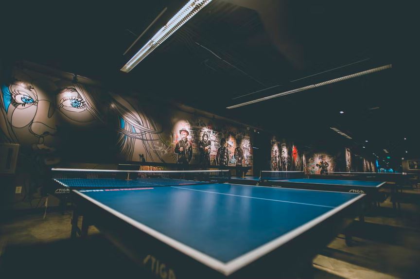 ping pong tables in a room