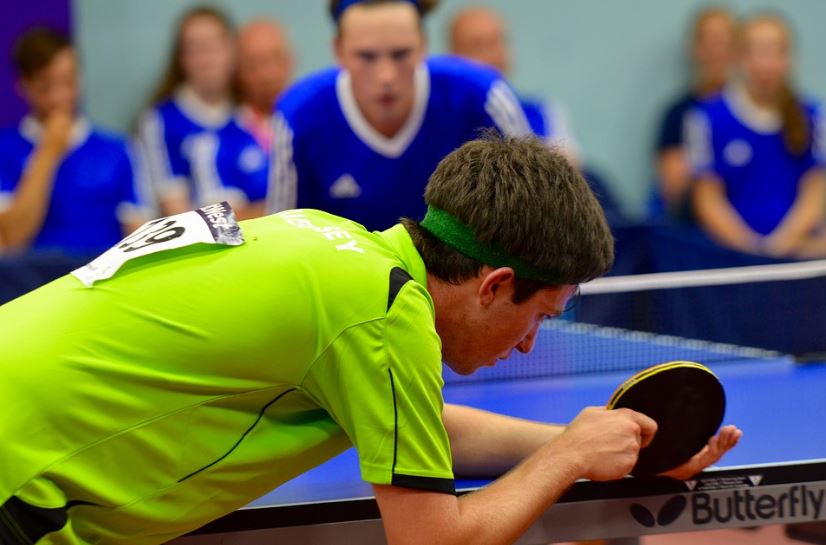 table tennis player playing on Butterfly ping pong table